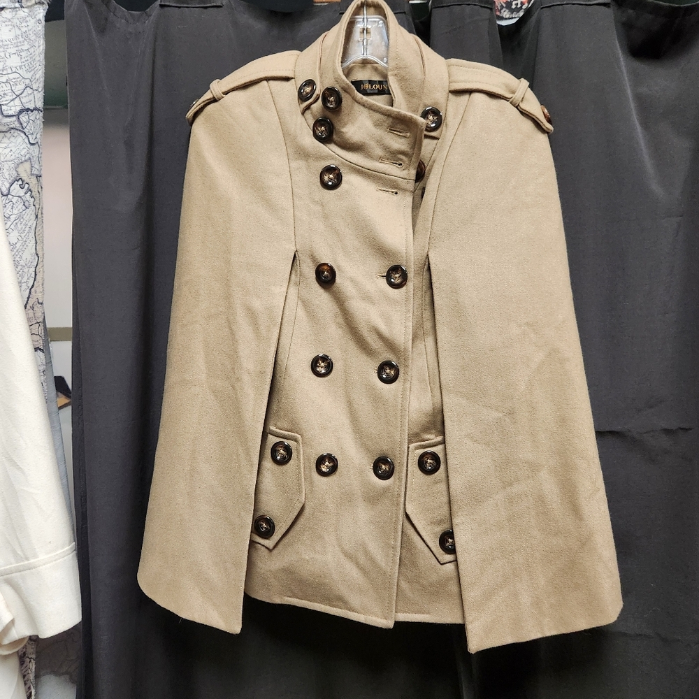 Camel cape with lots of buttons.